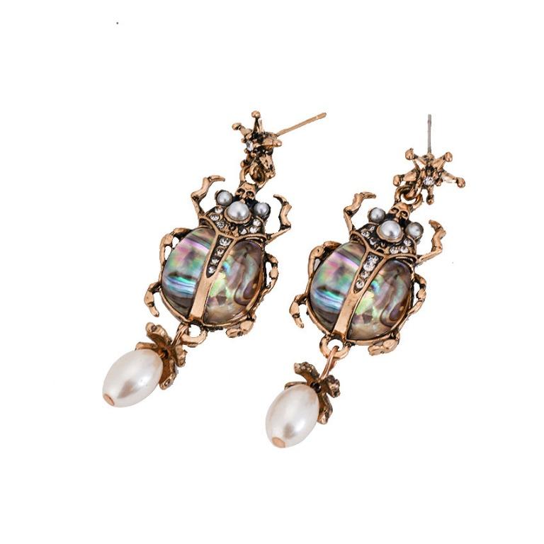 Alexander mcqueen beetle earrings on sale