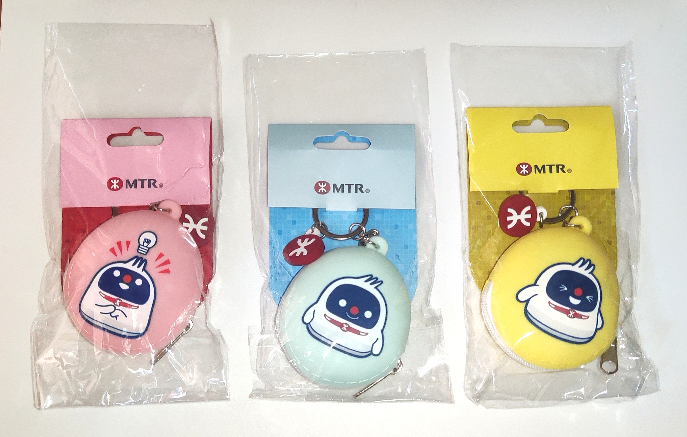 港鐵MTR 鐵仔散紙包/銀仔包/鎖匙扣 x3, 名牌, 手袋及銀包 - Carousell
