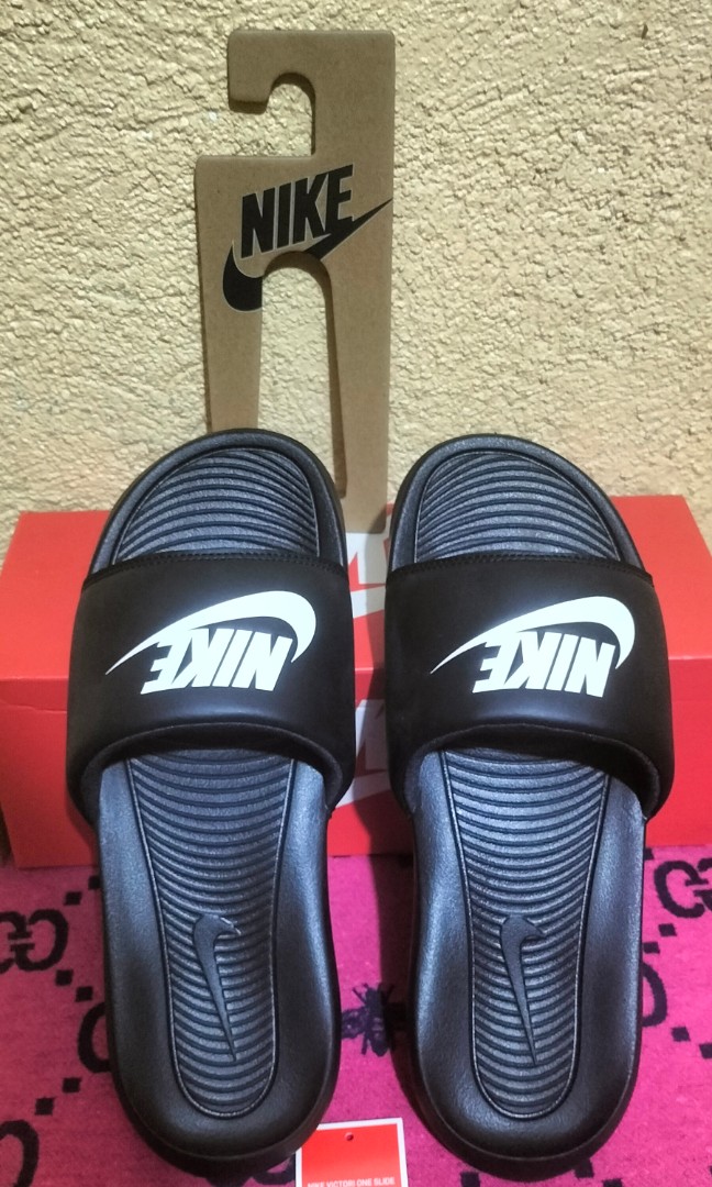 shrunken nike slides