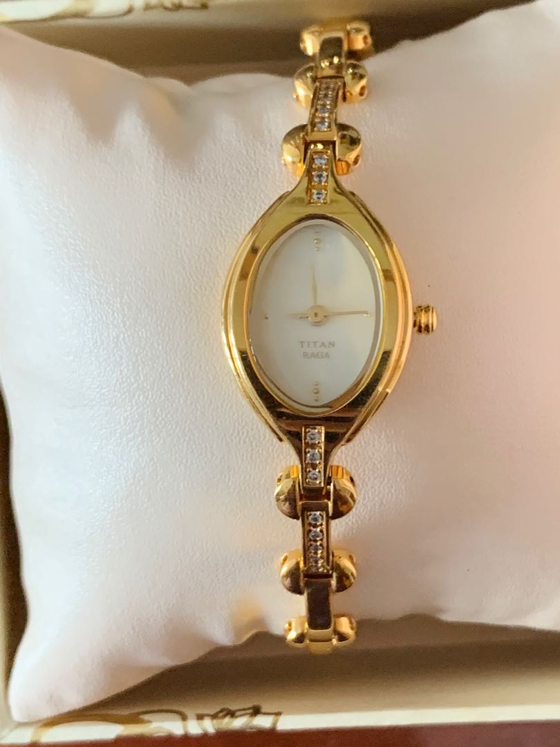 Raga titan women's gold watch top