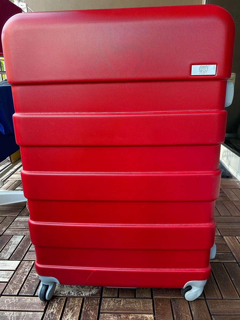 Big red suitcase hot sale