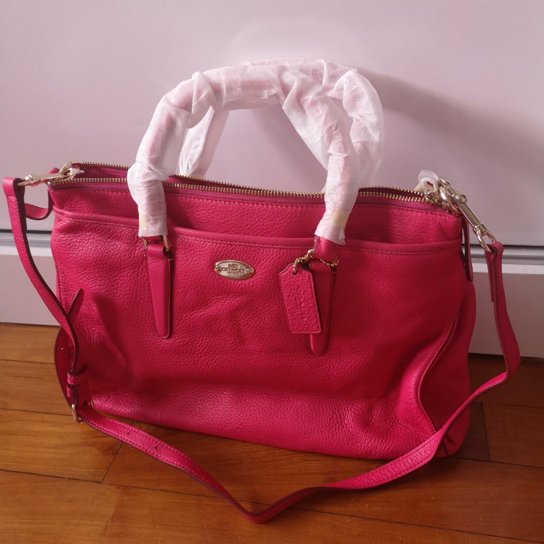 Pink coach 2025 purses on clearance