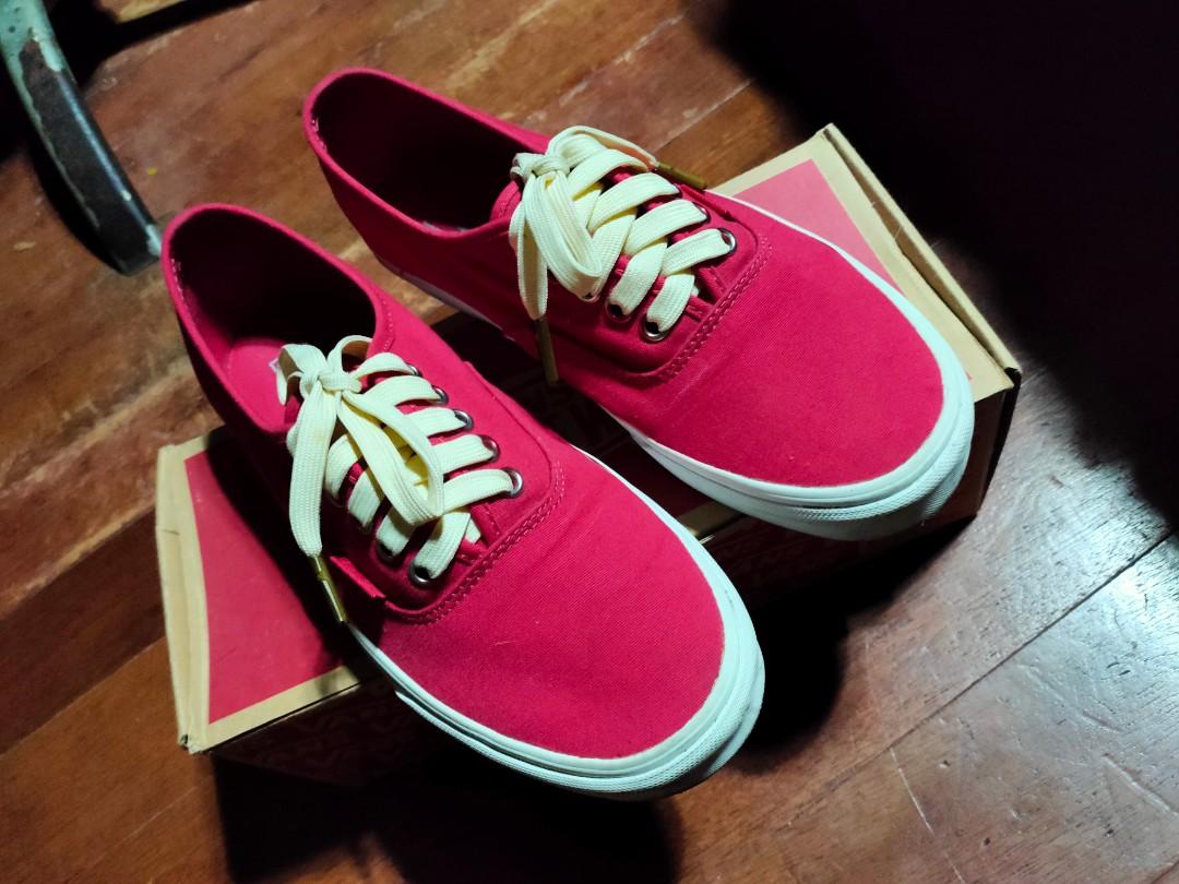 all red vans with gold eyelets