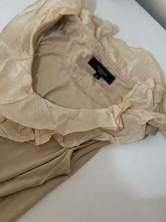 Vintage sleeveless top with ruffles