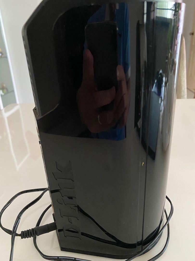 DLink modem (Category: Networking) located in Singapore. Submitted by 1848kcc (Listing ID 1103208807, Image 3). Description: Clean No defects or damage With power point plug .