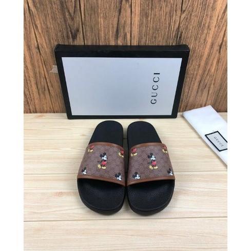 Gucci disney slides best sale mens