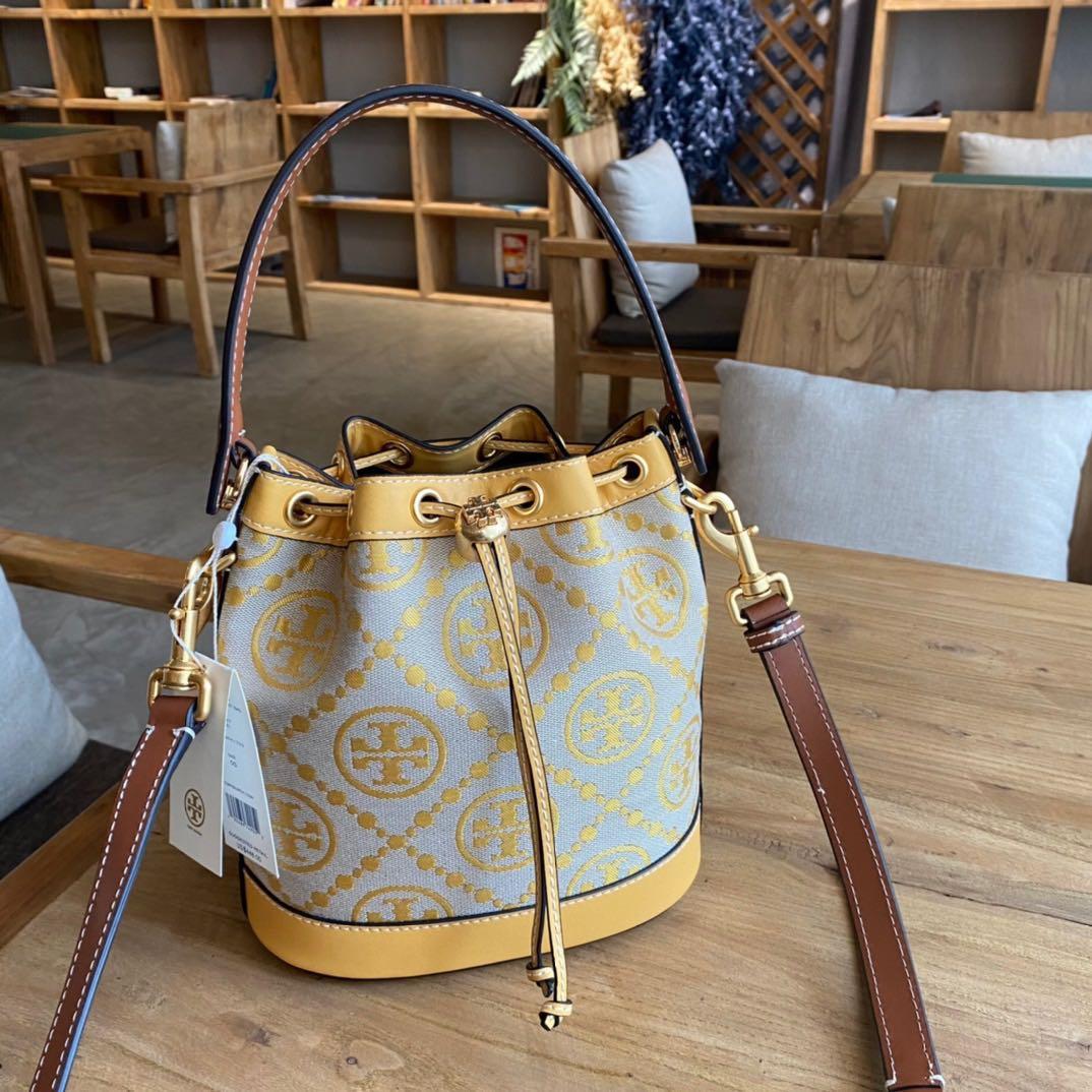 New 2021. Tory Burch T Monogram Bucket Bag, Women's Fashion, Bags &  Wallets, Purses & Pouches on Carousell