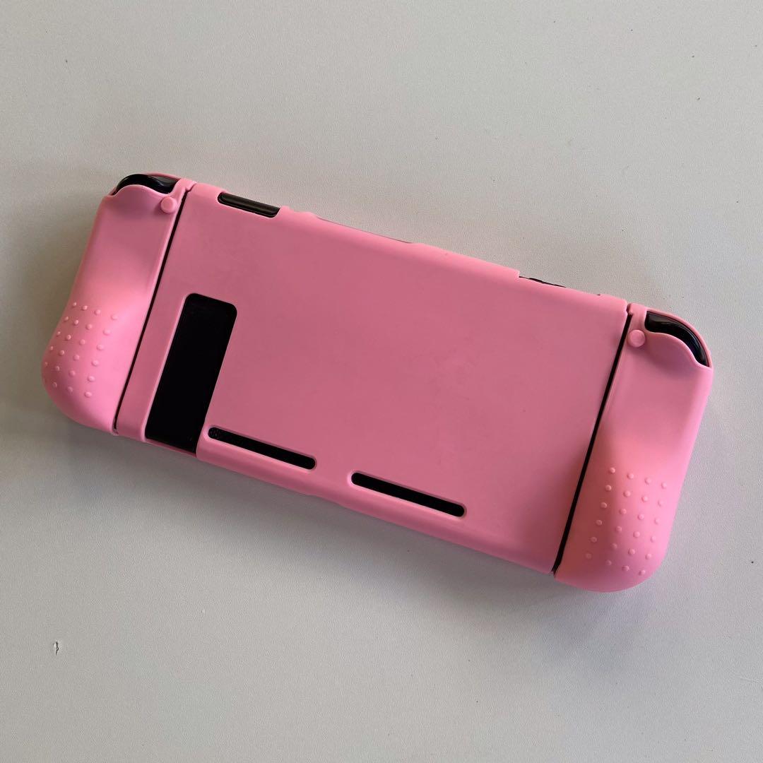 Pink Nintendo Switch Soft Case (Category: Nintendo) located in Santa Rosa. Submitted by catshup (Listing ID 1103231340, Image 2). Description: 🍅 Pink Nintendo Switch Soft Case - covers the full switch - has grip !! - fits a little loose but overall still very nice - 350 (shipped) 🥫 slightly nego and can give more photos, just send a message! 🥫 MOP: GCash 🥫 MOD: GGX.
