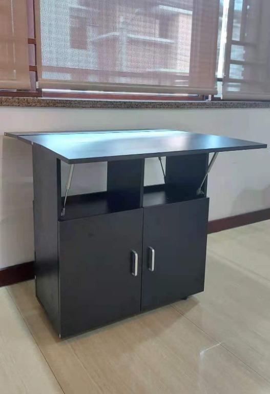 Black Dining Table with Cabinet Foldable Multipurpose Table (Category: Tables & Sets) located in Manila. Submitted by affordshopz (Listing ID 1103399869, Image 2). Description: Multipurpose Table - Actual Picture Posted Actual Size:80*80*79 cm packaging size:81.5*42*21.7 cm packaging weight:27 kg Material : Wooden Black Dining Table Computer Table Laptop Table Study Table 𝕄𝕠𝕣𝕖 𝕒𝕗𝕗𝕠𝕣𝕕𝕒𝕓𝕝𝕖 𝕒𝕟𝕕 𝕢𝕦𝕒𝕝𝕚𝕥𝕪 𝕚𝕥𝕖𝕞𝕤? 𝑽𝒊𝒔𝒊𝒕 