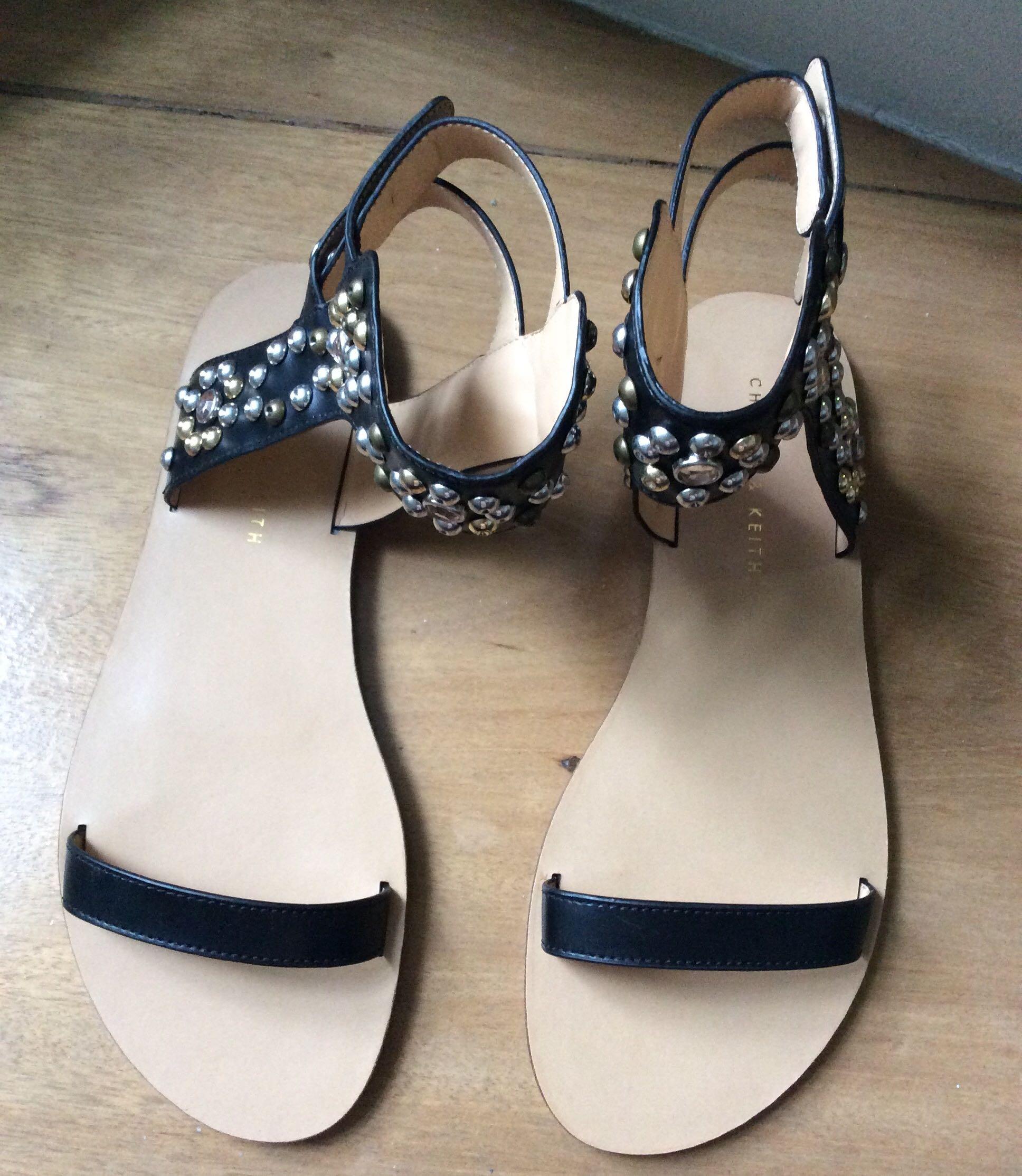 BNWOT Charles and Keith studded sandals (Category: Flats & Sandals) located in Quezon City. Submitted by redddtag (Listing ID 1103482270, Image 2). Description: Charles and Keith studded sandals Size 36 Never worn, just kept in storage Selling low because of peeling on the inside of straps of the sandals. Kept in storage for quite some time and Never worn or tried on since NO PIC WHEN WORN (doesn't fit me anymore) NO LBC COP NO Shopee check out P