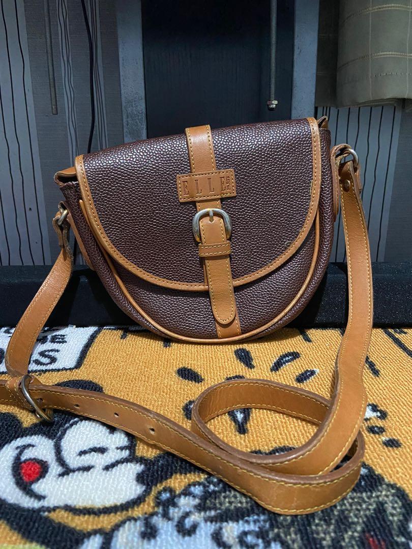 Original Elle Paris Vintage style (Category: Shoulder Bags) located in Angono. Submitted by lyssavii (Listing ID 1103460483, Image 1). Description: Pre loved, used but not abuse, signed of usage.