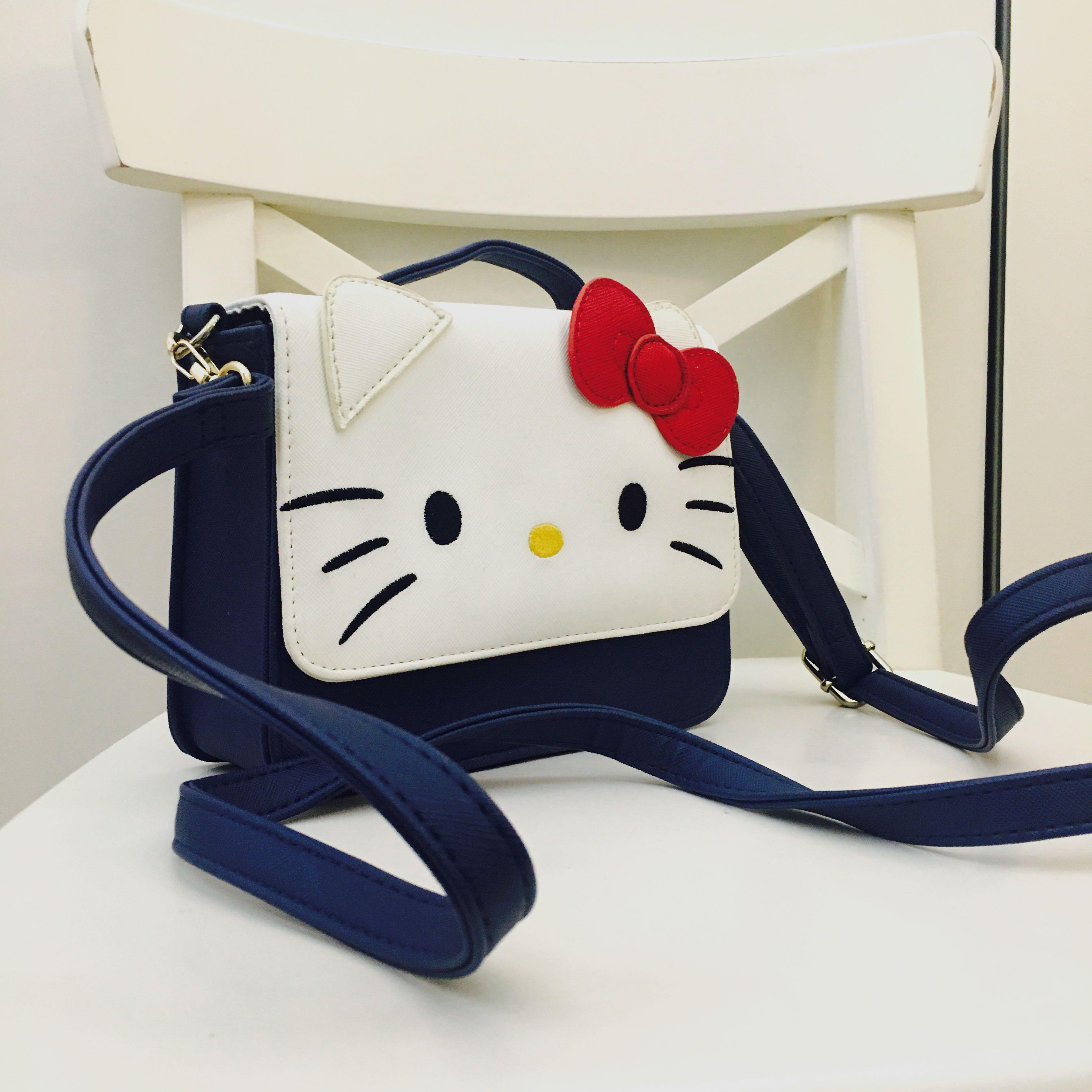 Kitty sling bags best sale