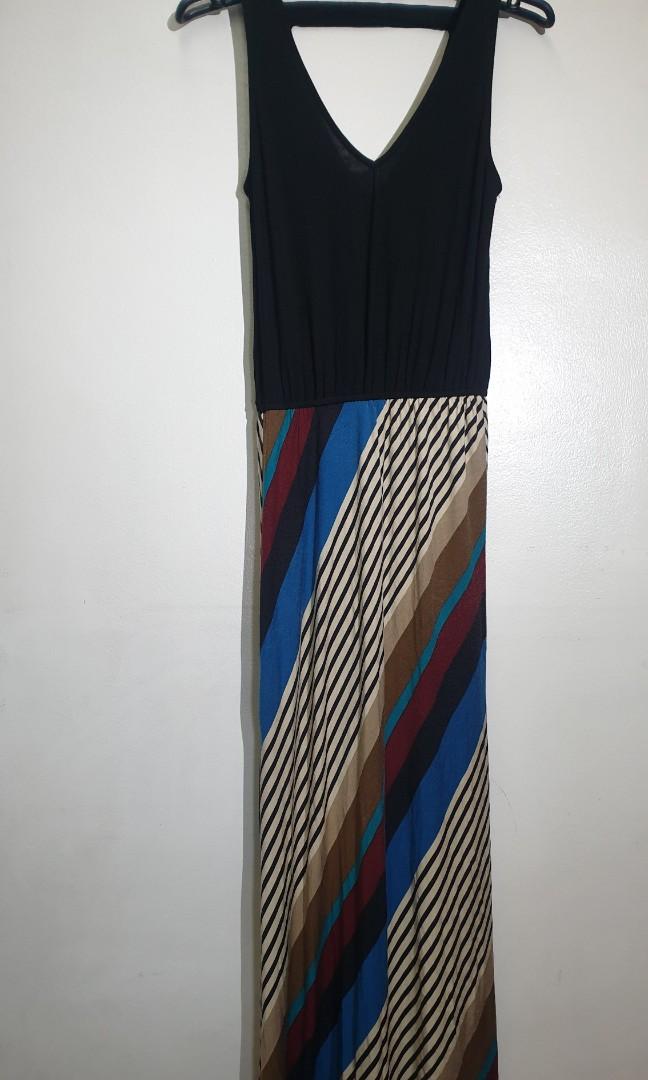 Sleeveless V Neck Maxi Dress (Category: Dresses) located in Mandaluyong City. Submitted by purselove (Listing ID 1103459738, Image 2). Description: *Combination Black with Multicolor striped sleeveless V-necked cotton maxi dress *Beautiful when worn * Fits XS to M *Bought in the US (Nordstrom Rack), used twice, then stored..