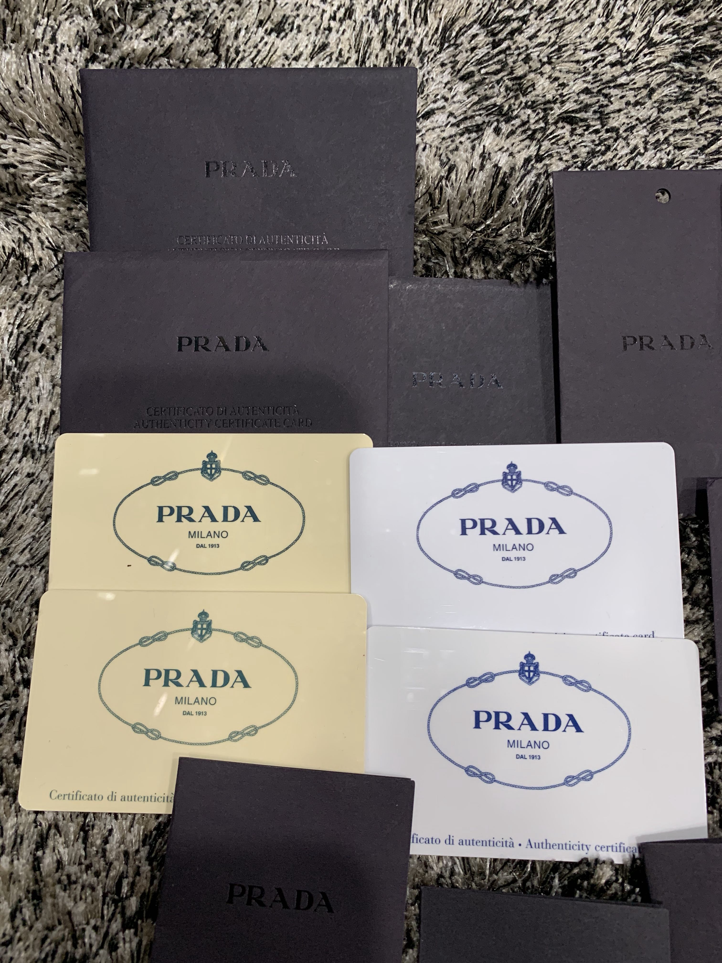 Authentic Prada authenticity card, care cards, receipt envelope and tags,  Luxury, Accessories on Carousell