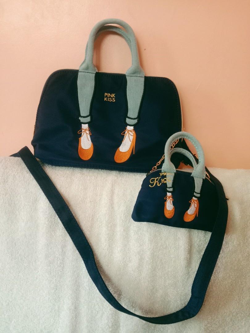 Pink kiss purses sales