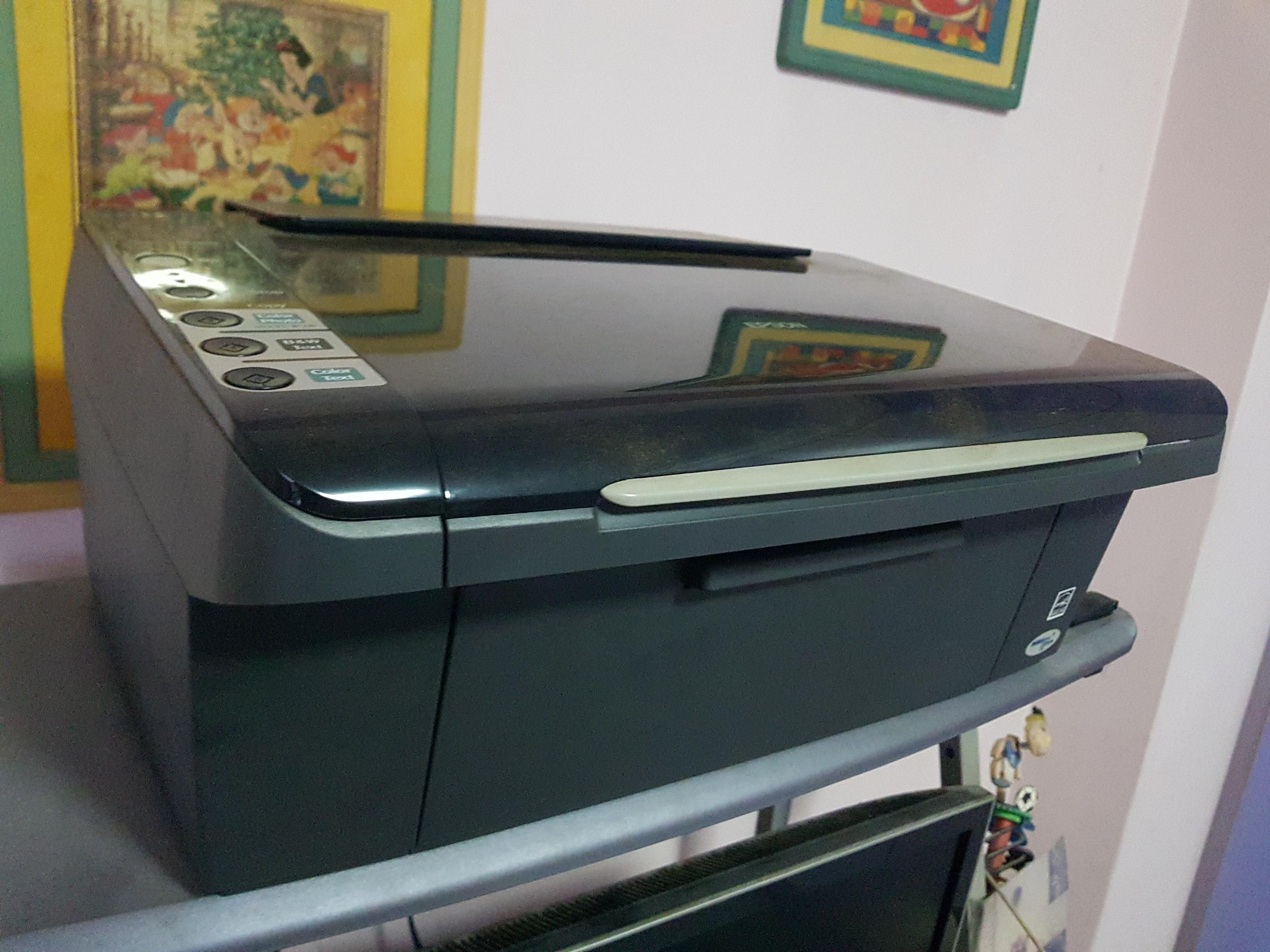 Epson Printer and Scanner (Category: Printers, Scanners & Copiers) located in Singapore. Submitted by fishtales86 (Listing ID 1103832421, Image 3). Description: Epson inkjet printer and scanner. Can copy too. Comes with brand new USB cable and power cable with adaptor. Will be packed into a box for ease of carrying..