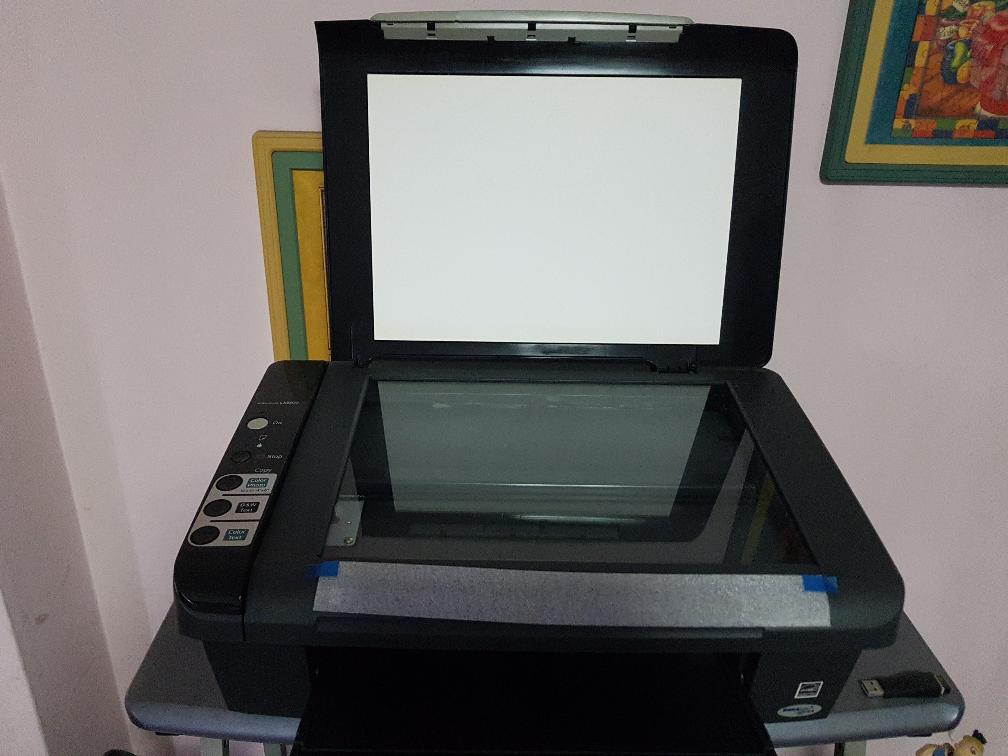 Epson Printer and Scanner (Category: Printers, Scanners & Copiers) located in Singapore. Submitted by fishtales86 (Listing ID 1103832421, Image 2). Description: Epson inkjet printer and scanner. Can copy too. Comes with brand new USB cable and power cable with adaptor. Will be packed into a box for ease of carrying..