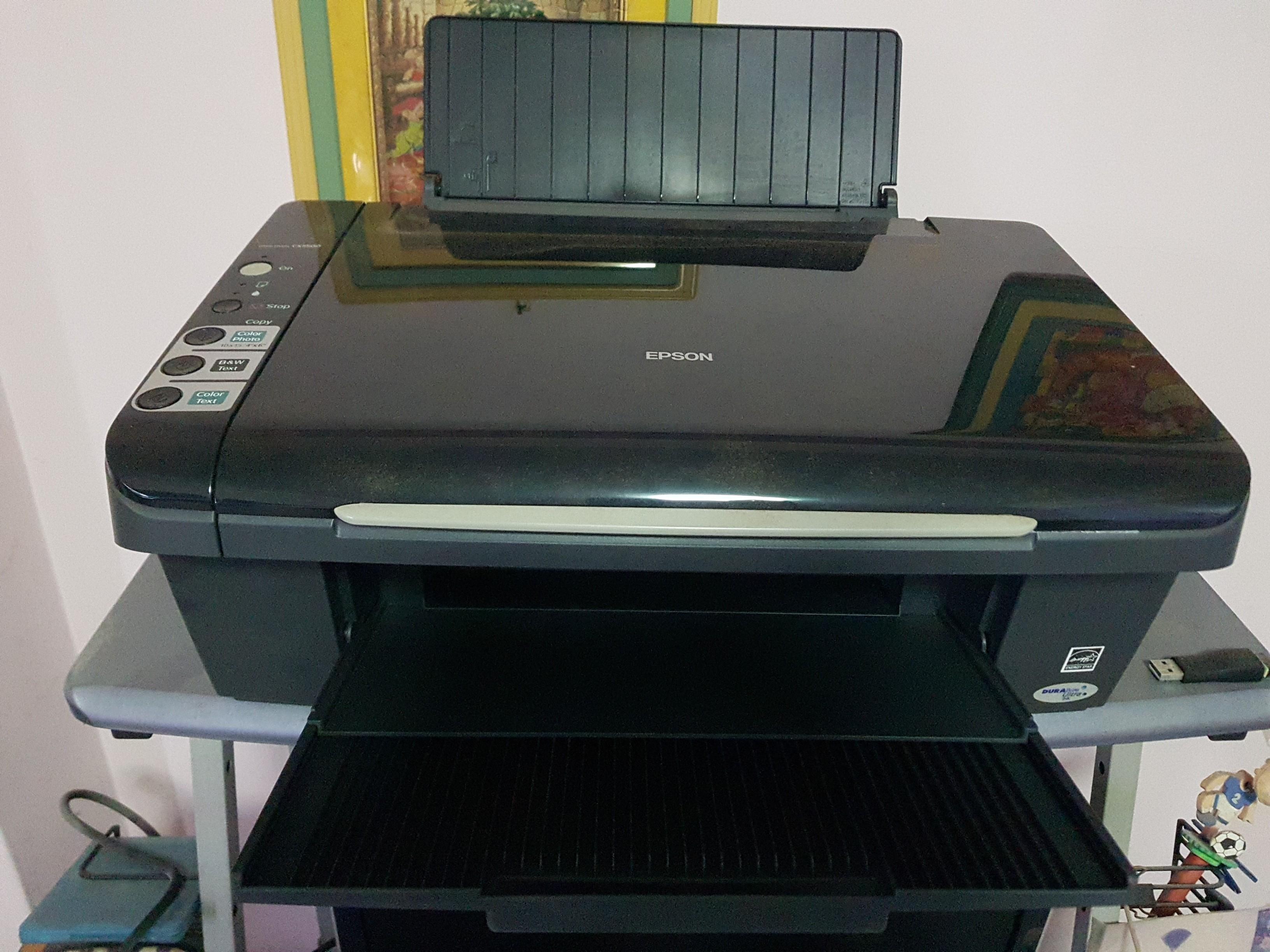Epson Printer and Scanner (Category: Printers, Scanners & Copiers) located in Singapore. Submitted by fishtales86 (Listing ID 1103832421, Image 1). Description: Epson inkjet printer and scanner. Can copy too. Comes with brand new USB cable and power cable with adaptor. Will be packed into a box for ease of carrying..