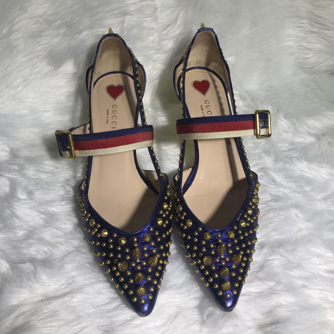 Gucci Blue Metallic Spiked Kitten Heels (Category: Heels) located in Manila. Submitted by cookie.cutter (Listing ID 1103729874, Image 2). Description: •Original & Authentic •Pre-loved •Kitten heels • Comes with box, dust bag, tag, and heel replacements • Size on shoe: 38 1/2 • Made in Italy.