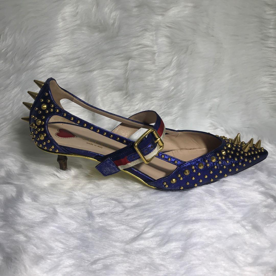 Gucci Blue Metallic Spiked Kitten Heels (Category: Heels) located in Manila. Submitted by cookie.cutter (Listing ID 1103729874, Image 3). Description: •Original & Authentic •Pre-loved •Kitten heels • Comes with box, dust bag, tag, and heel replacements • Size on shoe: 38 1/2 • Made in Italy.