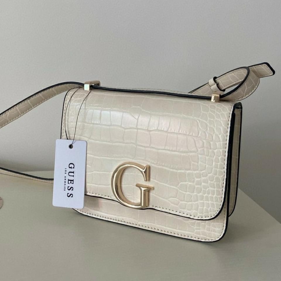 GUESS Corily Crossbody Bag (Category: Cross-body Bags) located in Taguig. Submitted by poshcity (Listing ID 1103724807, Image 2). Description: ✨PLEASE MAKE READING A HABIT✨ Facebook page: @poshcity Stated down below all the details and informations about the item. Shop at your own risk. BAGS ARE ALL ON HAND 💕 👜: GUESS Corily Crossbody Bag ✨: Black, Tan, Red, Gold and White ❎NO COD OR COP— Payment first policy ❎FORM FOR SURE BUYERS ONLY .