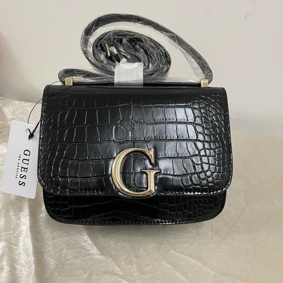 GUESS Corily Crossbody Bag (Category: Cross-body Bags) located in Taguig. Submitted by poshcity (Listing ID 1103724807, Image 1). Description: ✨PLEASE MAKE READING A HABIT✨ Facebook page: @poshcity Stated down below all the details and informations about the item. Shop at your own risk. BAGS ARE ALL ON HAND 💕 👜: GUESS Corily Crossbody Bag ✨: Black, Tan, Red, Gold and White ❎NO COD OR COP— Payment first policy ❎FORM FOR SURE BUYERS ONLY .