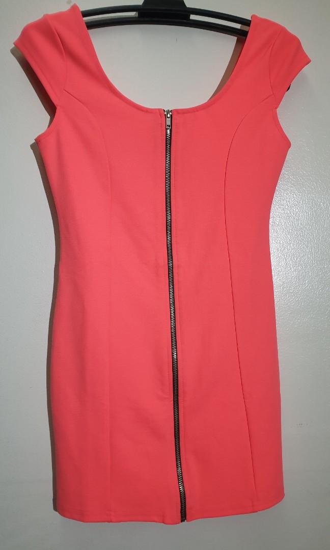 BNWT H&M Bodycon Dress (Category: Dresses) located in Mandaluyong City. Submitted by purselove (Listing ID 1103797122, Image 2). Description: *Brandnew with tag Neon orange colored Zip up Bodycon dress from Divided by H&M *Purchased in Tokyo for PHP750 then stored *L on label but fits S,M,L.