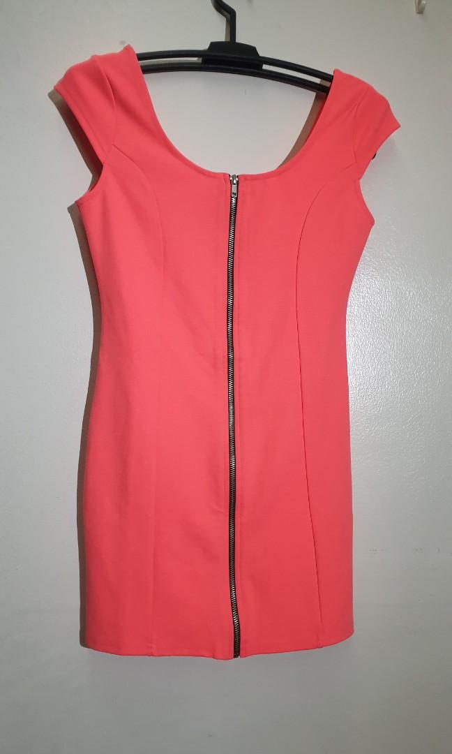 BNWT H&M Bodycon Dress (Category: Dresses) located in Mandaluyong City. Submitted by purselove (Listing ID 1103797122, Image 1). Description: *Brandnew with tag Neon orange colored Zip up Bodycon dress from Divided by H&M *Purchased in Tokyo for PHP750 then stored *L on label but fits S,M,L.