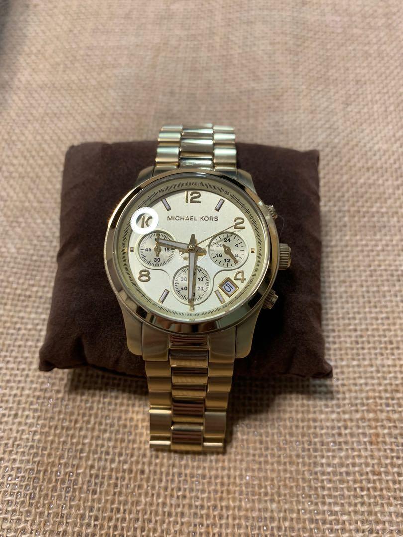 Michael Kors Large gold chronograph watch 8077 Women s Fashion