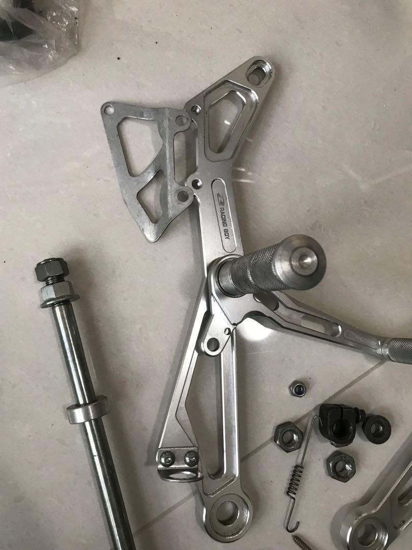 Racing Boy Footrest Yamaha 125z, Motorcycles, Motorcycle Accessories on Carousell