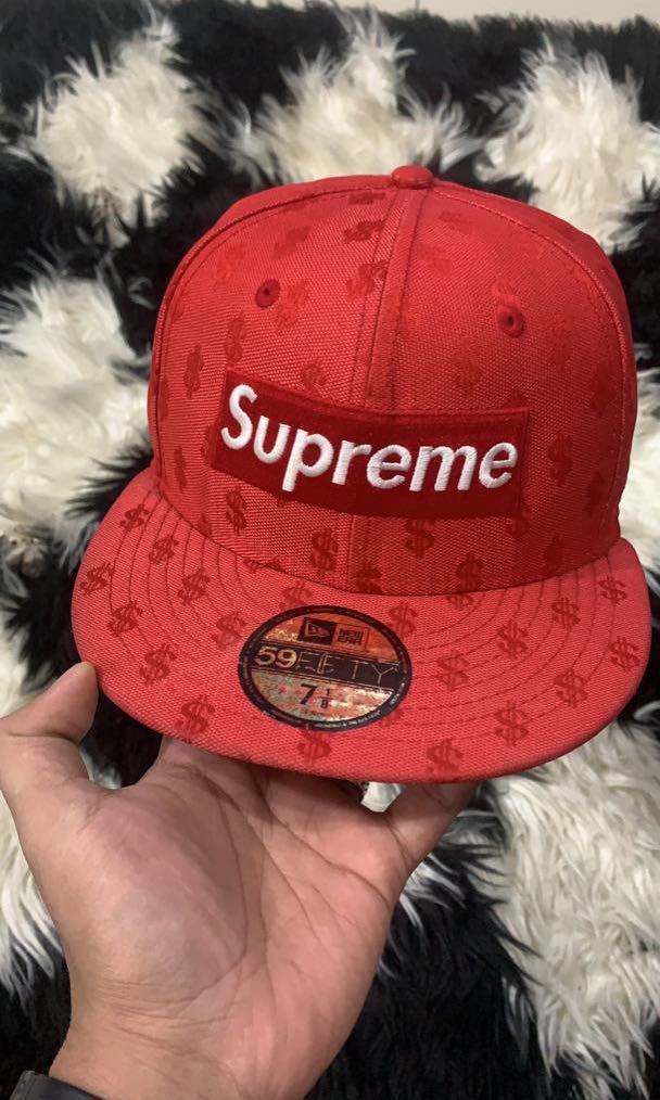Supreme dollar sign hat discount