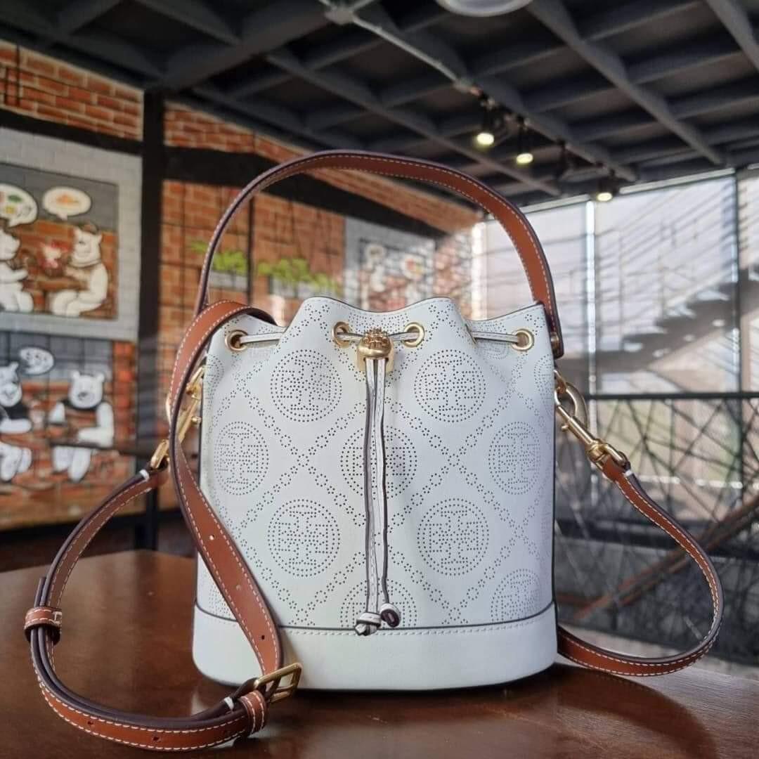 Tory Burch T Monogram Perforated Leather Bucket Bag, Women's Fashion, Bags  & Wallets, Cross-body Bags on Carousell
