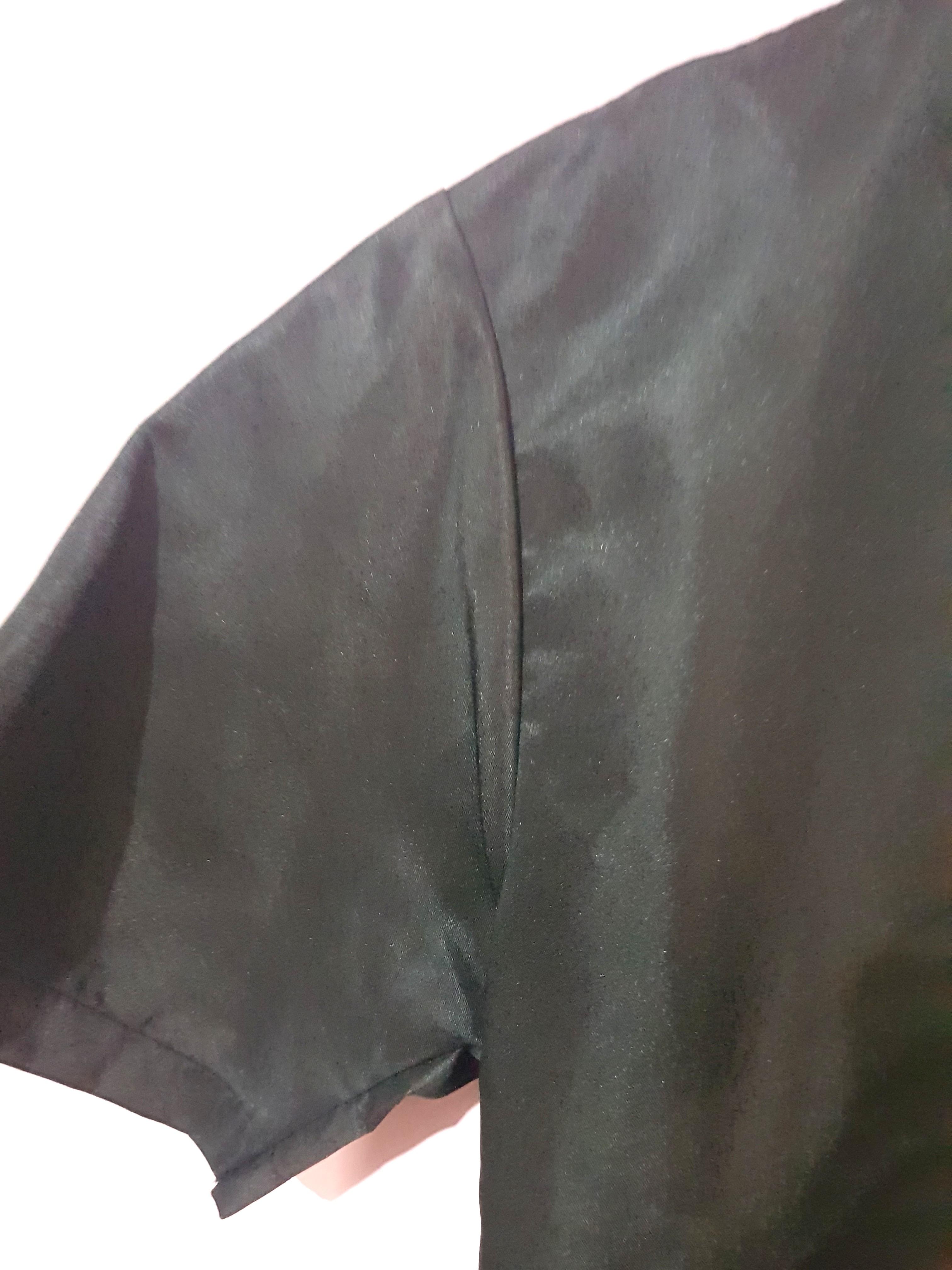 Unbranded Black Polo Shirt (Category: Tshirts & Polo Shirts ) located in Marikina City. Submitted by stuffbymart (Listing ID 1103842392, Image 3). Description: Condition: 10/10 Unused, only washed Original Price: 250 The fabric is like satin Size: Small Last pic is the item where I bought it.