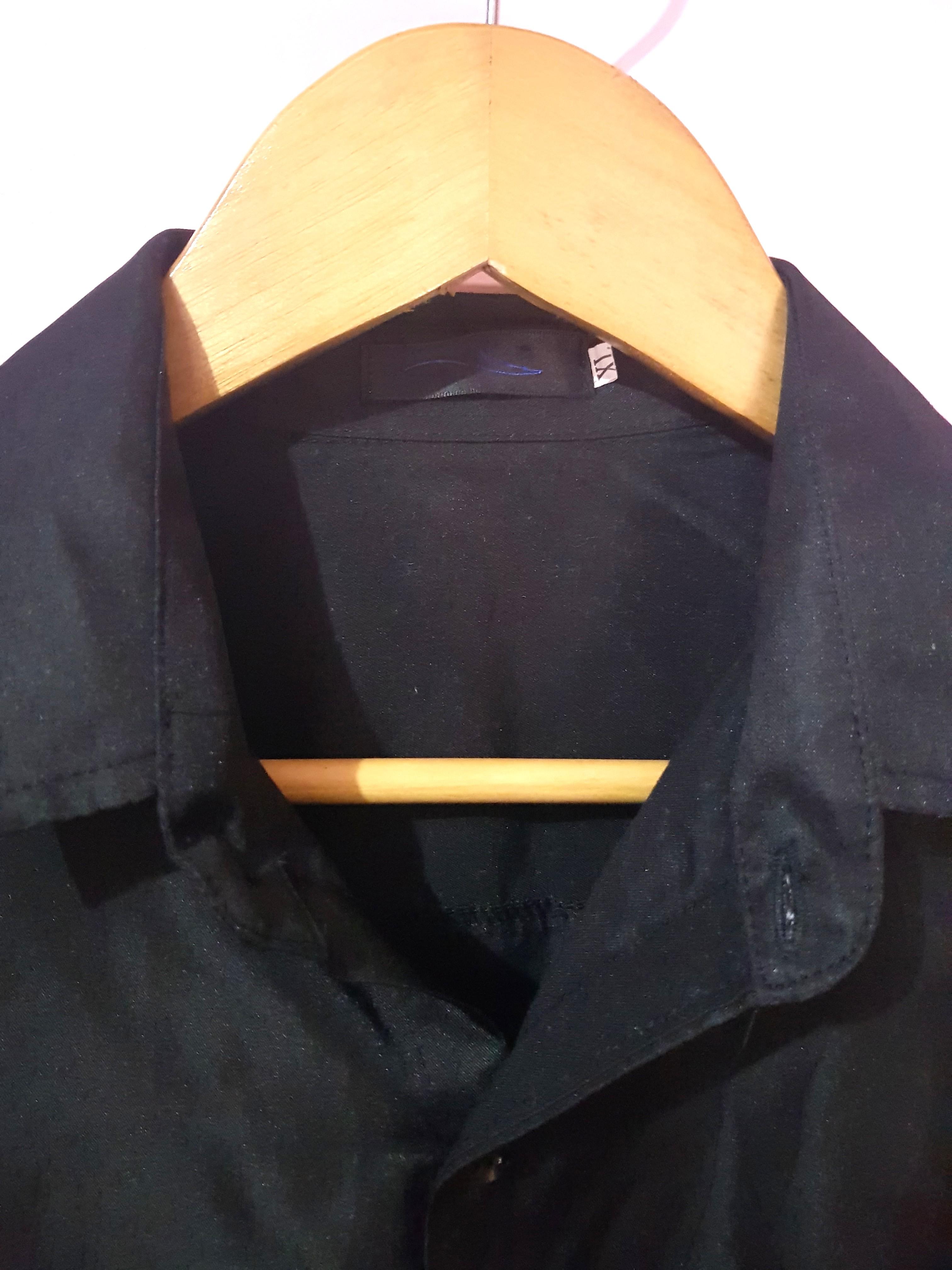 Unbranded Black Polo Shirt (Category: Tshirts & Polo Shirts ) located in Marikina City. Submitted by stuffbymart (Listing ID 1103842392, Image 2). Description: Condition: 10/10 Unused, only washed Original Price: 250 The fabric is like satin Size: Small Last pic is the item where I bought it.