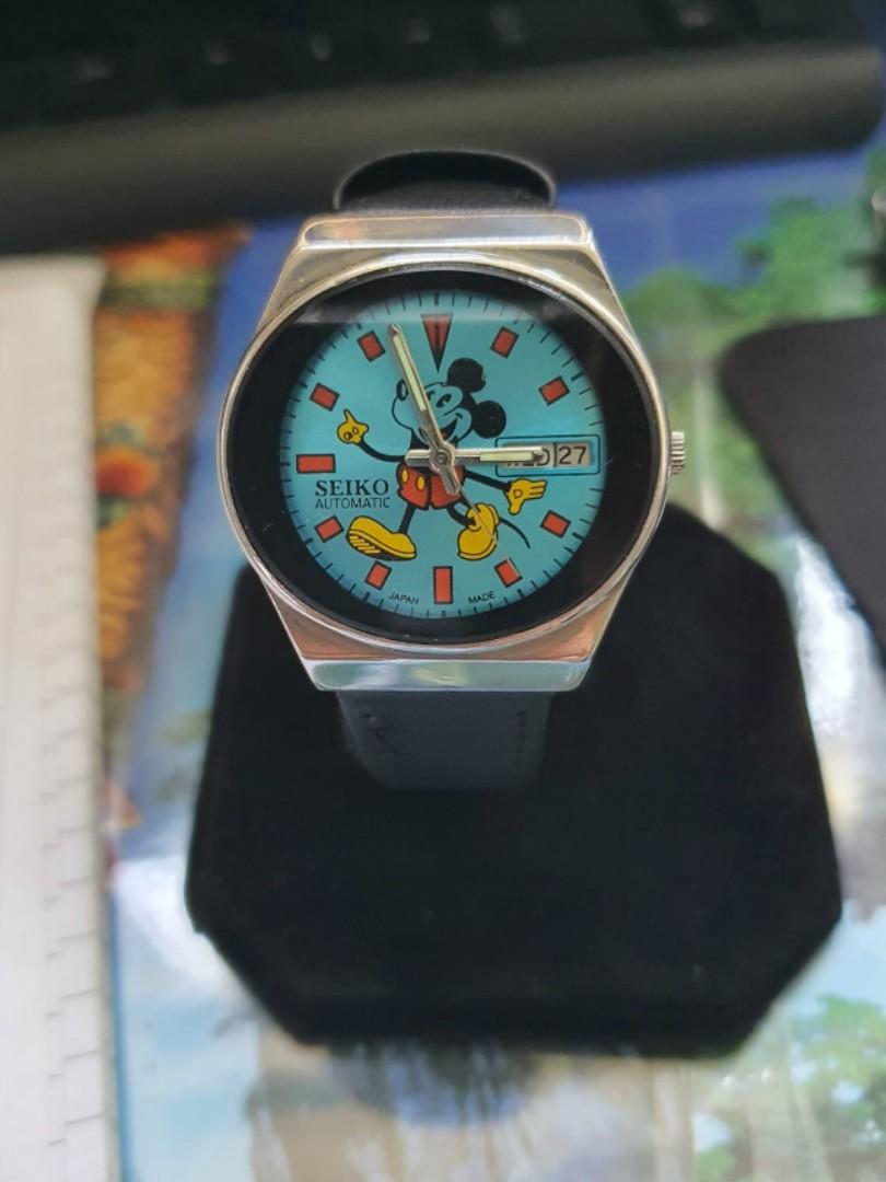 Seiko mickey mouse watch with day and date, Luxury, Watches on Carousell