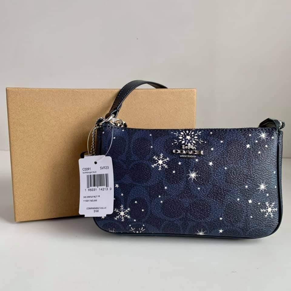 Nolita 19 In Signature Canvas With Snowflake Print Coach C0091