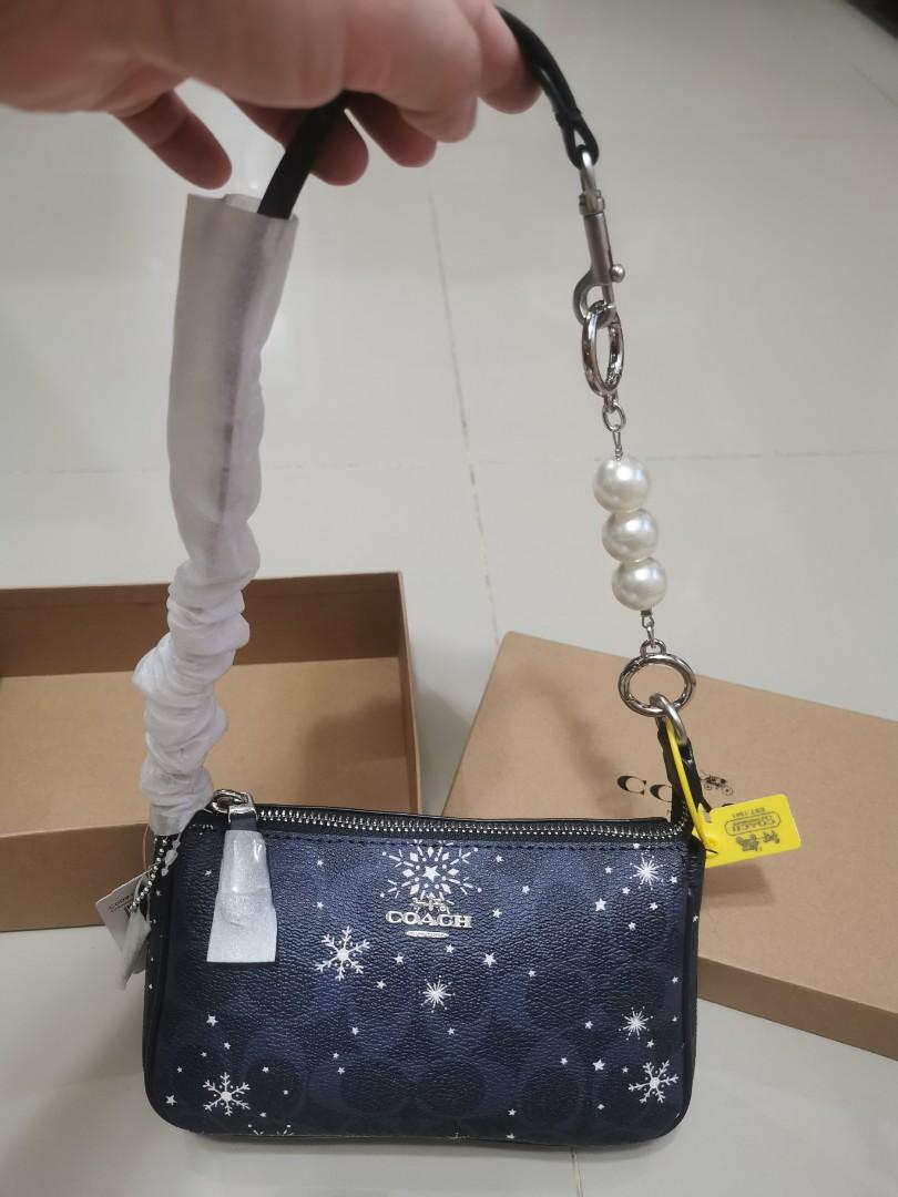Nolita 19 in signature canvas with snowflake print deals