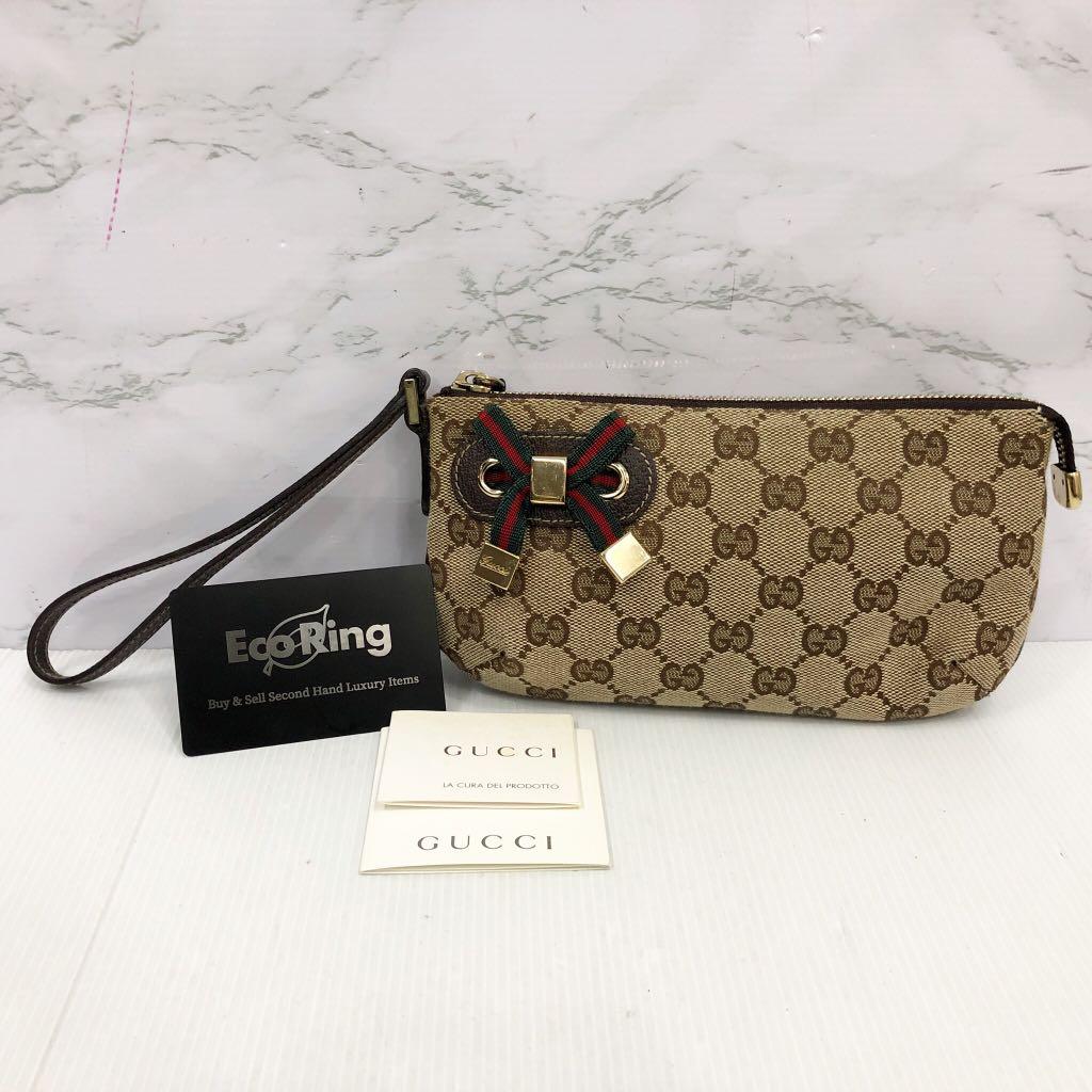 gucci canvas wristlet