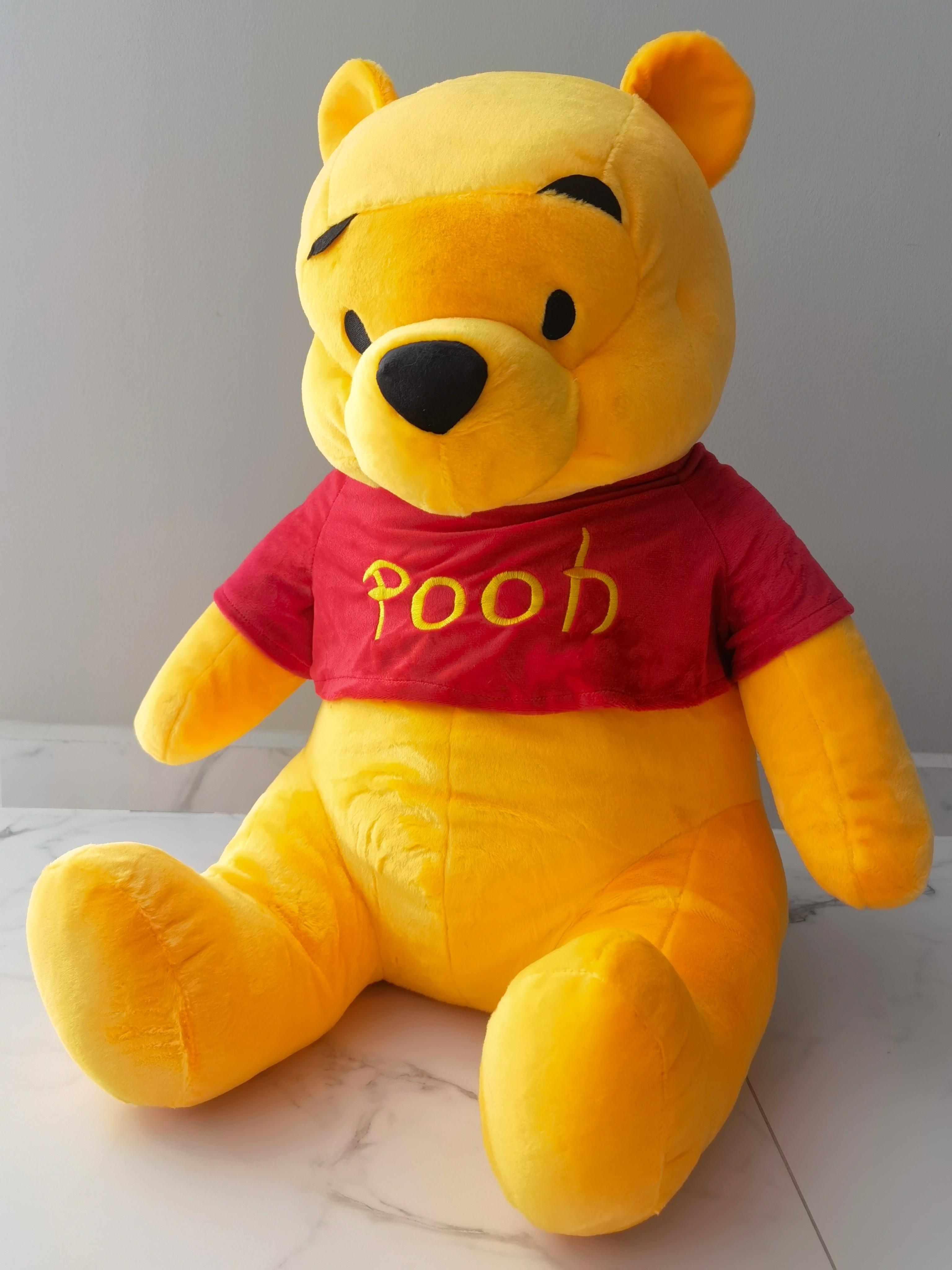 large pooh bear stuffed animal
