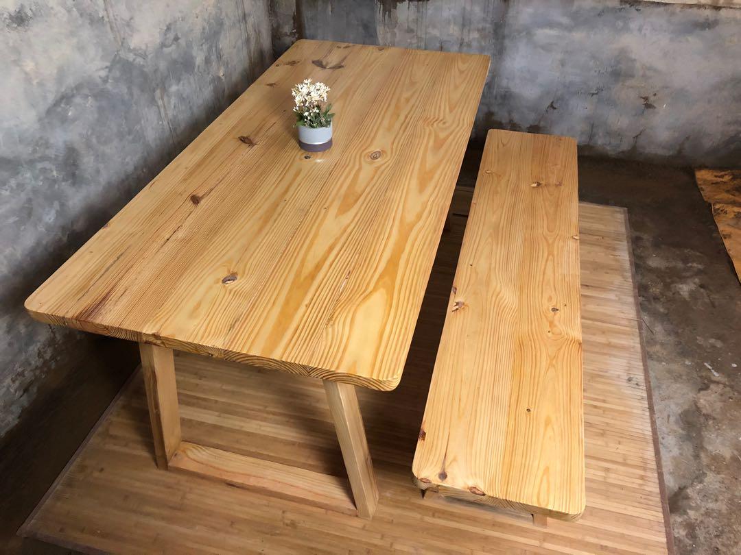 Dining Table & Bench Set (Category: Tables & Sets) located in Pasig City. Submitted by holzph (Listing ID 1104216467, Image 3). Description: Playing around with round edges. This table & bench batch set showcases a smooth corner design finish. Drawing from minimalist carving, this safe edge design is ideal for children family homes. 🏡 Table Measurements: Length: 180cm / 5’11” Width: 84cm / 33” Height: 76cm / 30” Thickness: 3.8cm / 1.5” Bench Mea