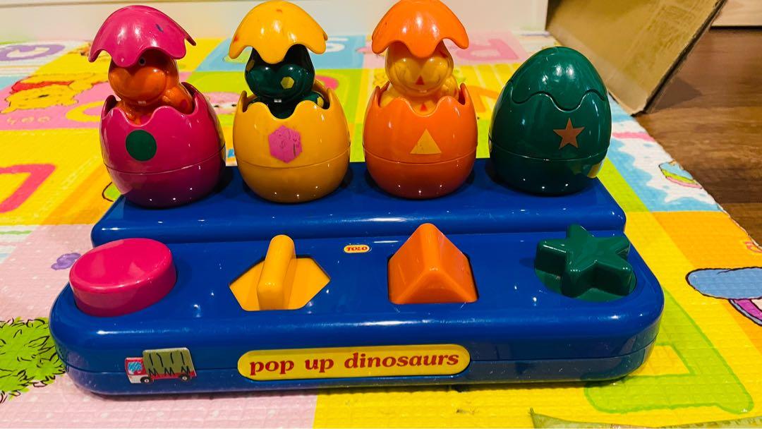 Pop up dinosaur toy discount
