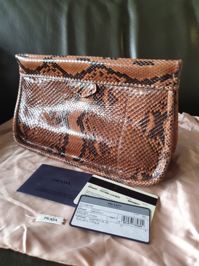 Prada Python Clutch, Women's Fashion, Bags & Wallets, Clutches on Carousell