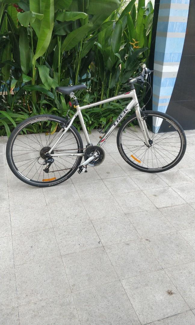Trek 7.3 hybrid bike price best sale