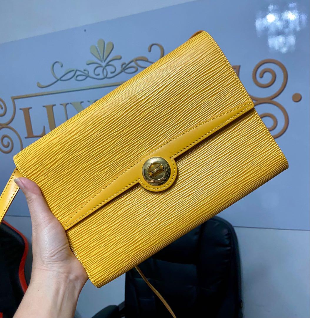 Louis Vuitton (LV) Epi Clutch bag (100% authentic), Luxury, Bags & Wallets  on Carousell