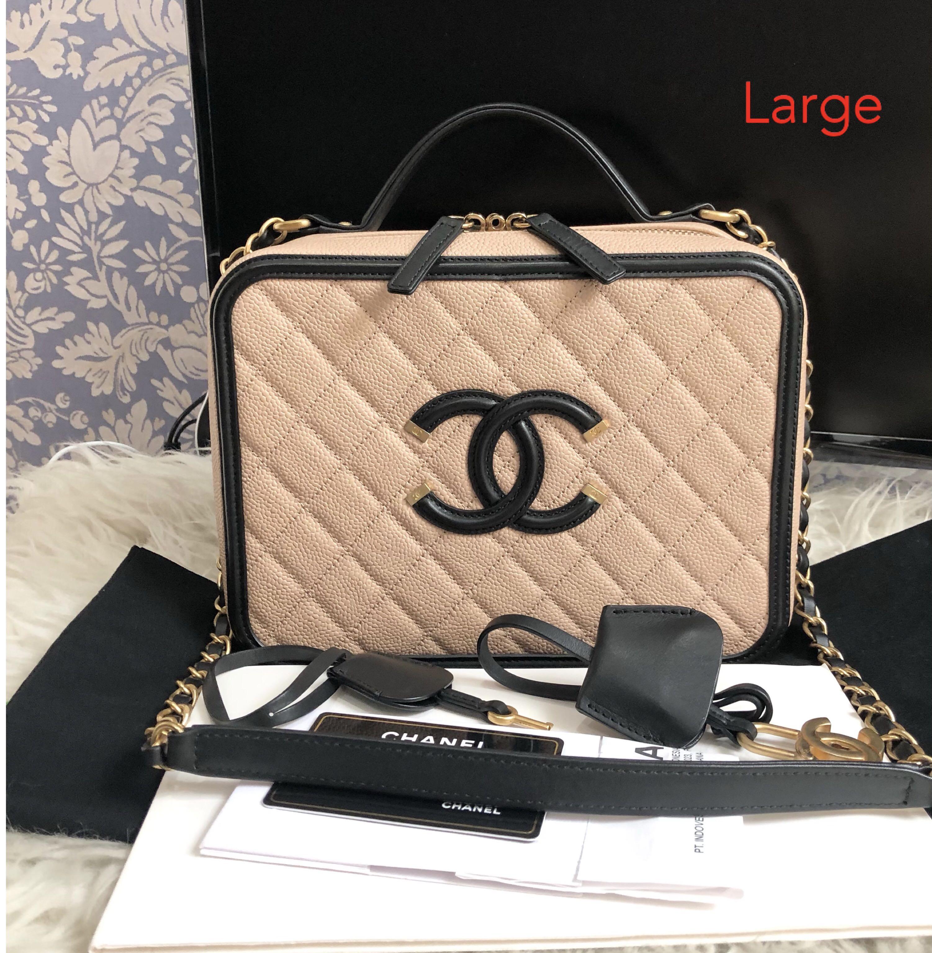 Chanel Vanity bag on chain with top handle, Luxury, Bags & Wallets on  Carousell