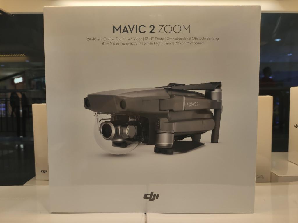 DJI MAVIC 2 ZOOM (Category: Drones) located in Quezon City. Submitted by mm177508 (Listing ID 1098565012, Image 1). Description: Powered by a 1/2.3-inch 12MP sensor with up to 4x zoom, including a 2x optical zoom (24–48 mm), 4 the Mavic 2 Zoom camera drone is all about dynamic perspectives. Up to 31 minutes flight time, 44 mph max speed, 905G takeoff weight, 3-axis gimbal for steady shots, 8GB internal storage, SD card Support up to 128 GB Functi
