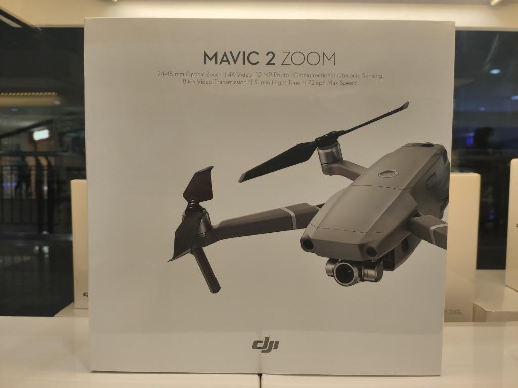 DJI MAVIC 2 ZOOM (Category: Drones) located in Quezon City. Submitted by mm177508 (Listing ID 1098565012, Image 2). Description: Powered by a 1/2.3-inch 12MP sensor with up to 4x zoom, including a 2x optical zoom (24–48 mm), 4 the Mavic 2 Zoom camera drone is all about dynamic perspectives. Up to 31 minutes flight time, 44 mph max speed, 905G takeoff weight, 3-axis gimbal for steady shots, 8GB internal storage, SD card Support up to 128 GB Functi