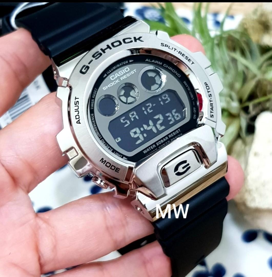G Shock silver stainless steel casing version black rubber band