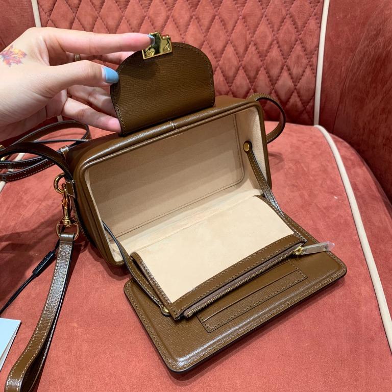 Gucci gg mini bag with clasp closure top