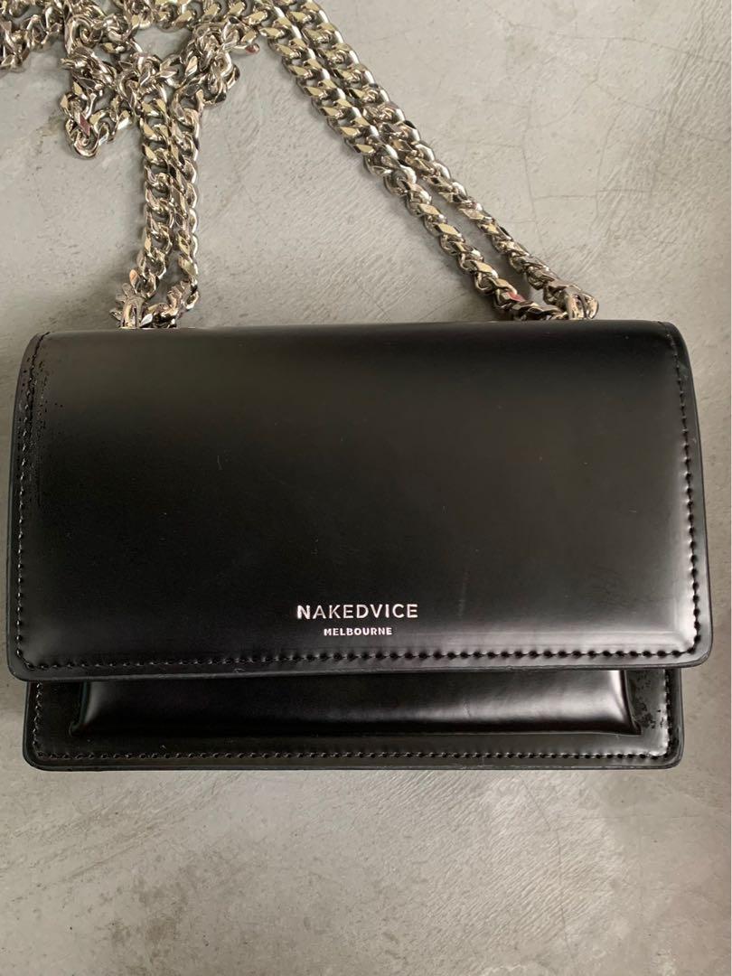 The regis shop silver side bag